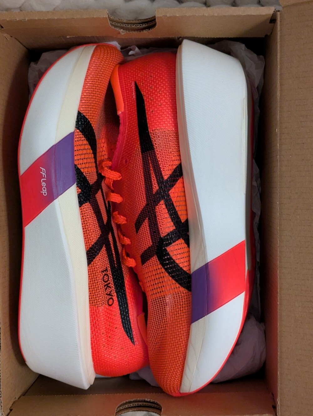 ASICS Women's Metaspeed Sky Tokyo. Bright Orange and Black Racing Shoes. 7.5